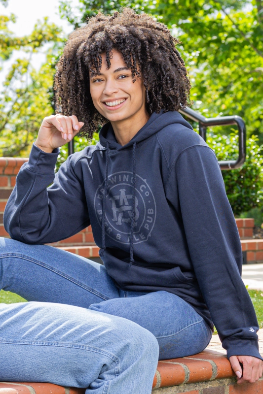 Young woman wearing a Badger Sport cap