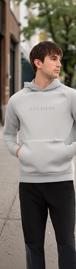 A person wearing a grey hoodie