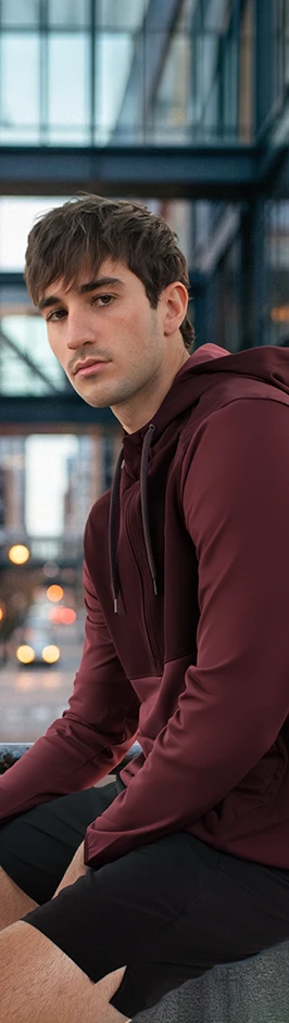 A person in a maroon hoodie
